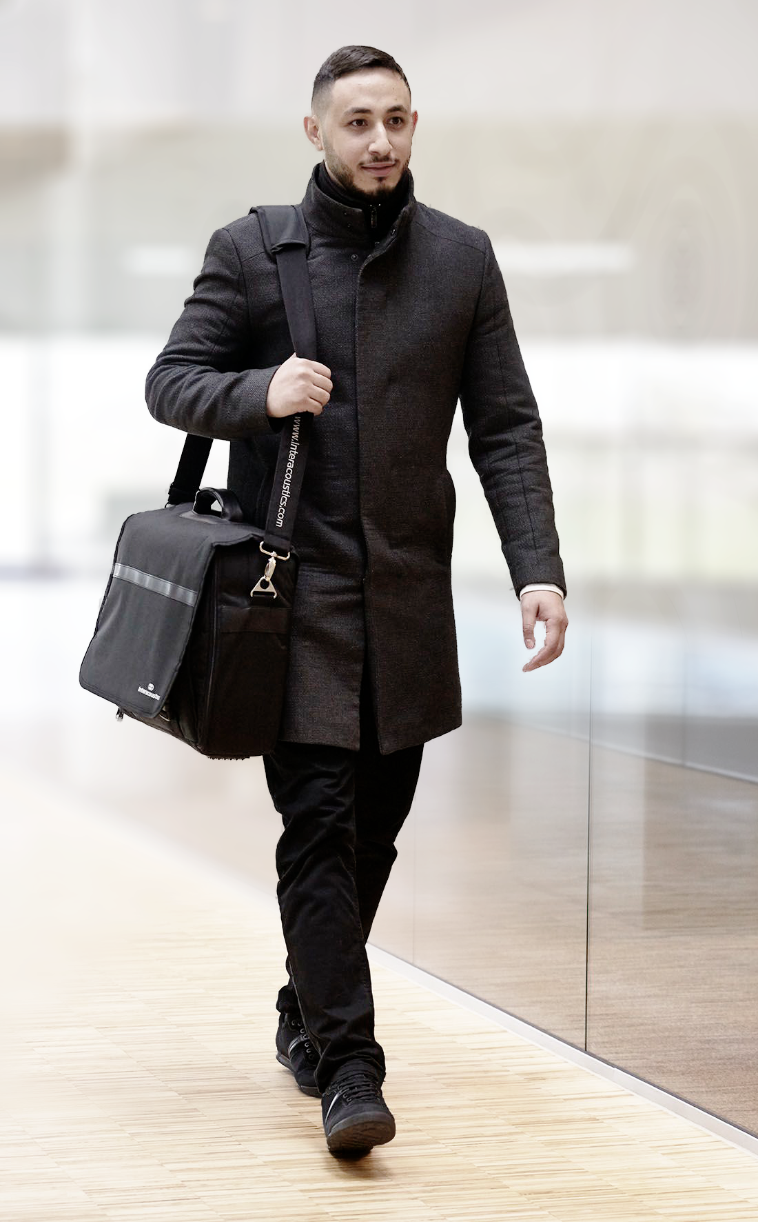 Man walking with AD528 carrying bag