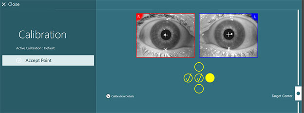 Calibration underway, visible by two yellow check marks for center and left, empty for up and down, and a solid yellow dot for the right position.