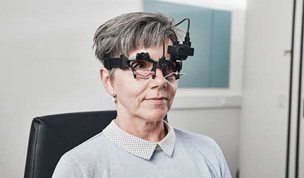 Woman wearing vHIT goggles