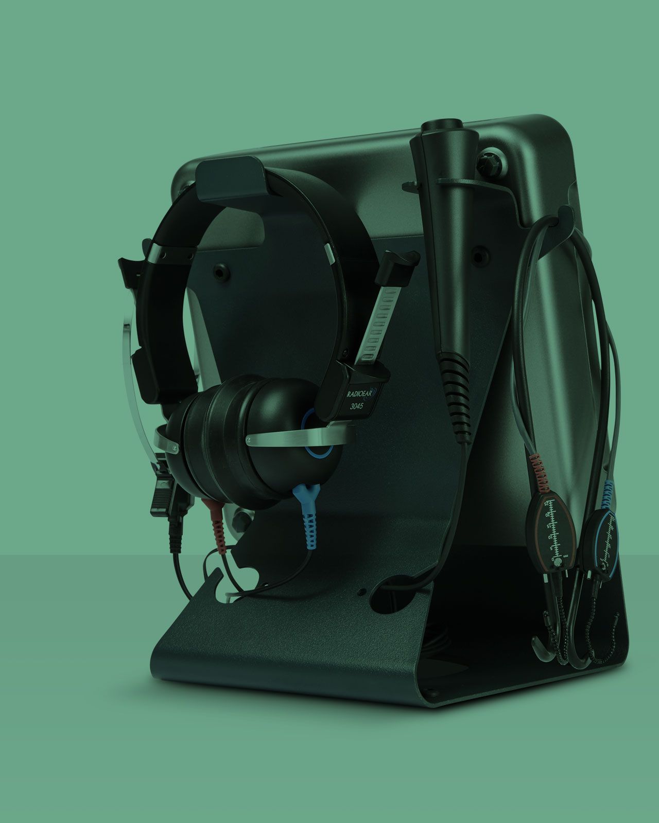 Affinity Compact version two resting in on-desk bracket alongside transducer and real-ear measurement headset.