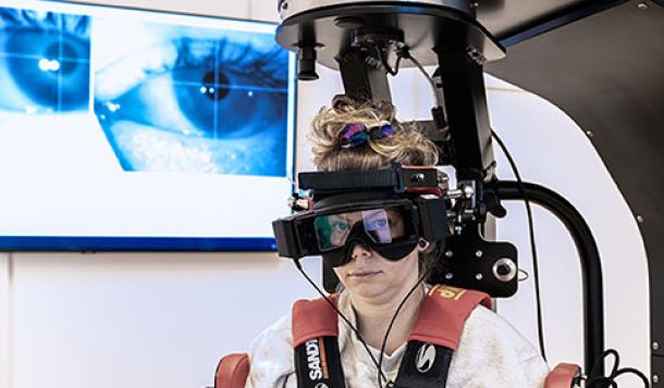 Woman in TRV Chair wearing VNG goggles