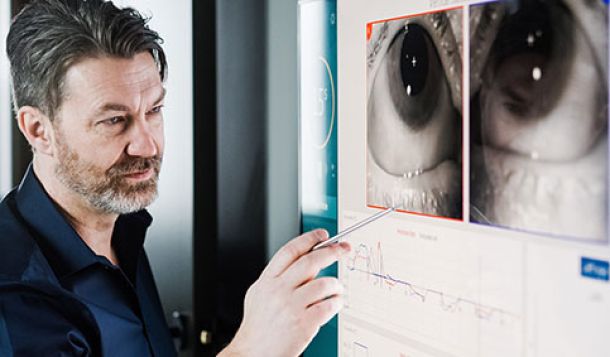 Glen Zielinski pointing at eye images in VNG software