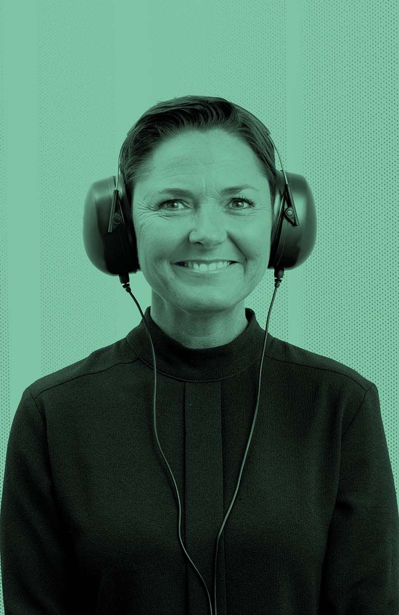 This is a photo of a woman that is being tested with audiometry from Interacoustics